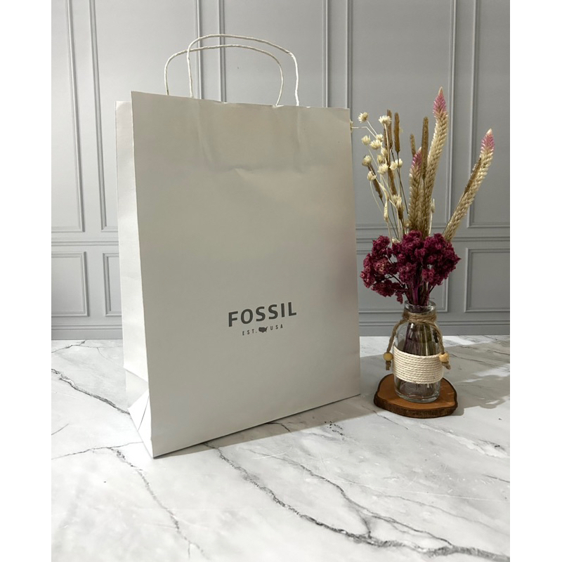 

Paper Bag Fossil Vertikal Muat Box Jam