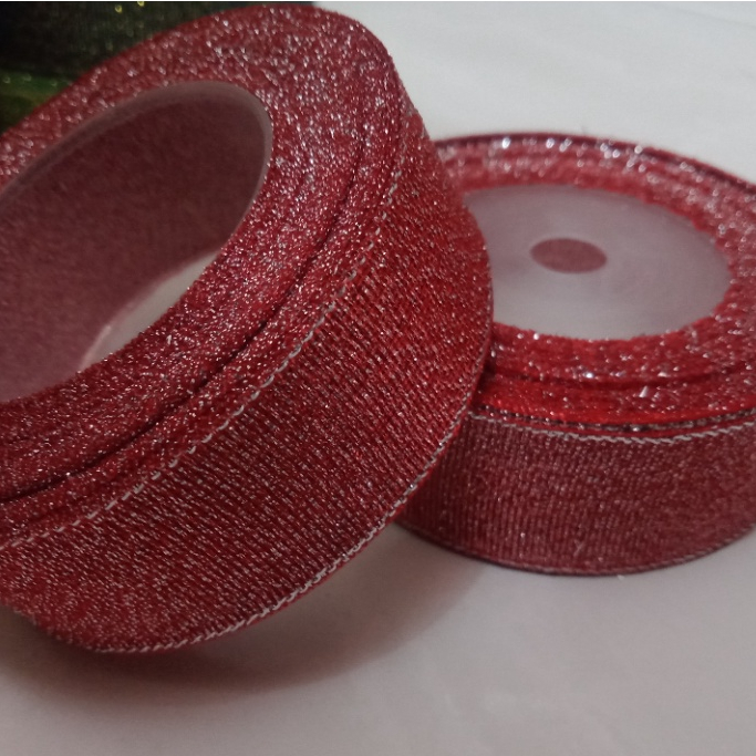 

Pita Gliter Merah Ukuran 1 inchi / 2,5 cm per Roll pita kado pita bucket bunga