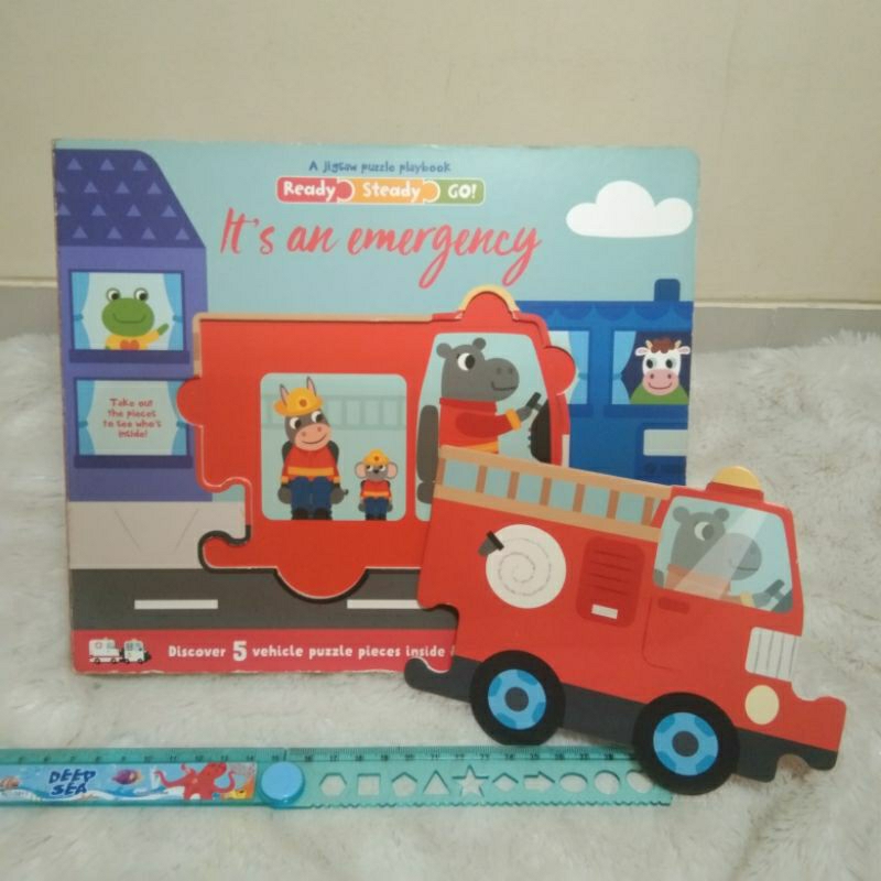 Buku anak boardbook A Jigsaw Puzzle Playbook Ready Steady Go 
IT'S AN EMERGENCY
Discover 5 vehicle p
