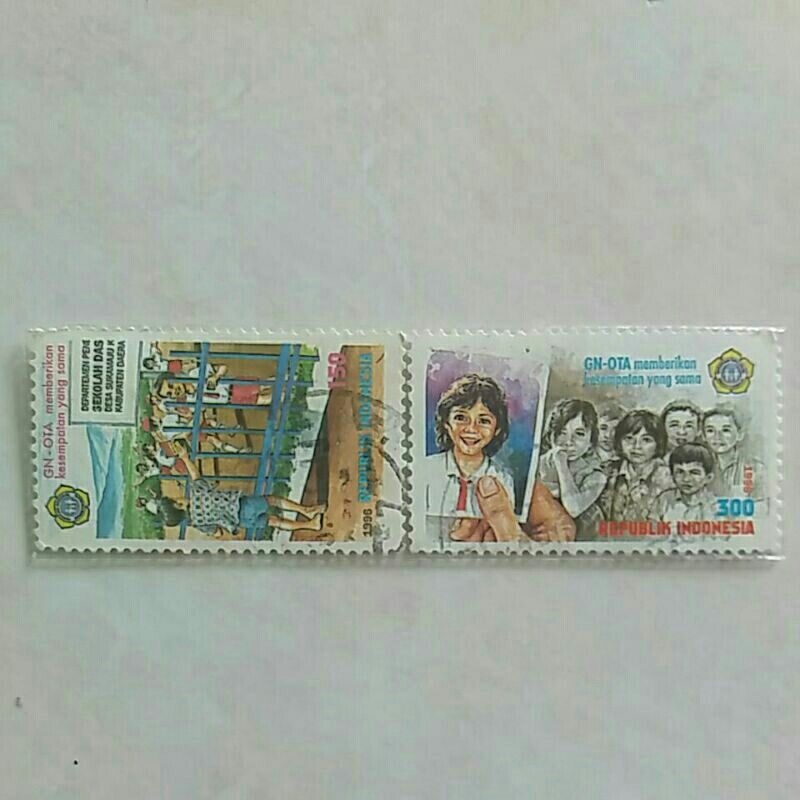 

(AC) Perangko Indonesia 1996 Gerakan Nasional Orang Tua Asuh Set Lengkap 2pcs Used
