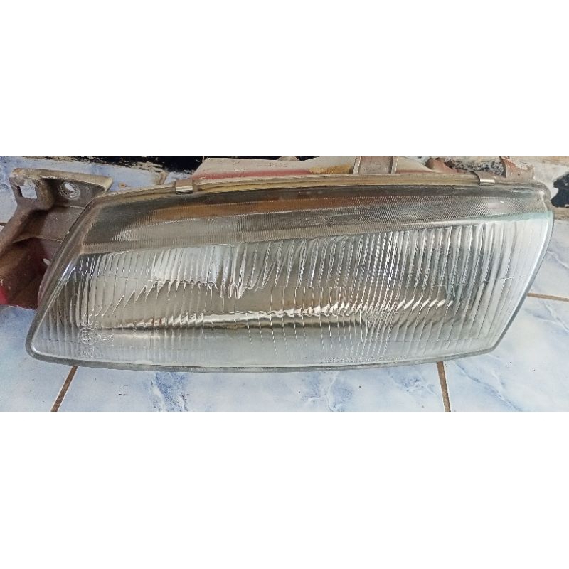 head lamp kia timor kiri