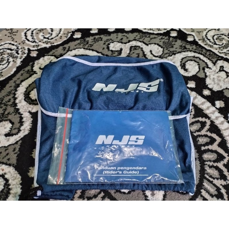 Sarung NJS Kairoz dan Buku Panduan