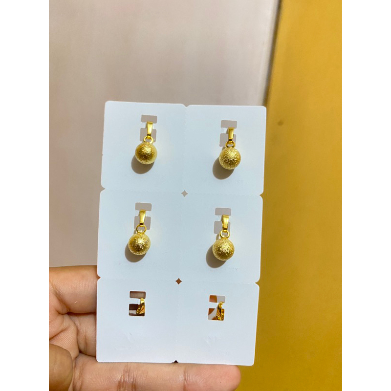 Liontin bulat pasir warna 24k