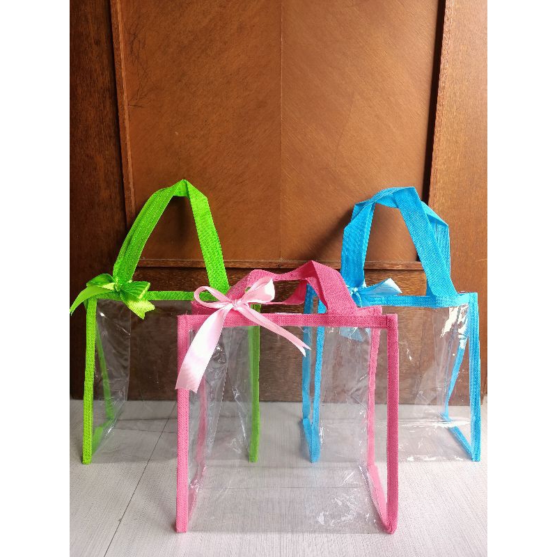 

Tas Mika Tenteng dengan list warna hampers lebaran transparan souvenir ultah