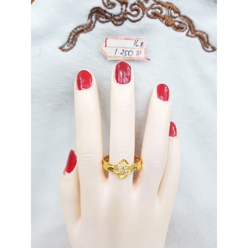 CCP3035F251F cincin model bunga permata putih emas kuning asli berat 1.250 no 23 d 2,1 kadar 70% 16k