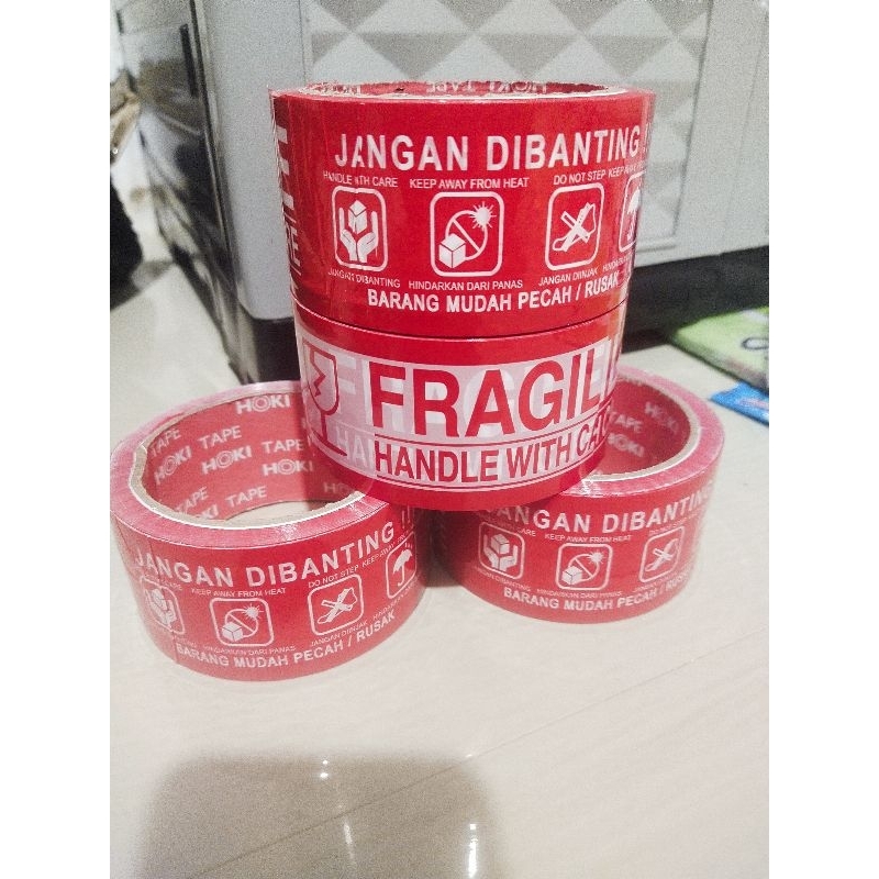 

lakban isolasi solatif fragile jangan dibanting 48mm 100 yard