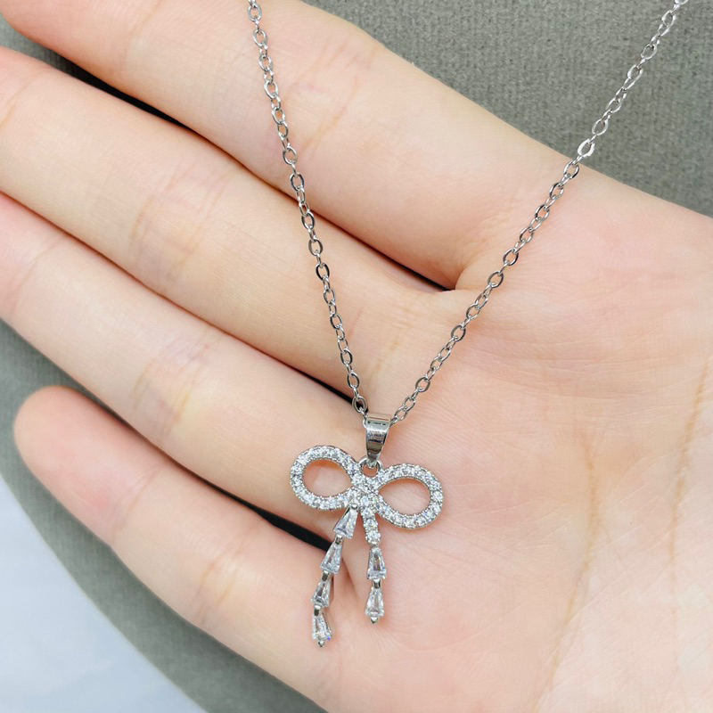 Kalung Titanium Pita juntai permata wanita