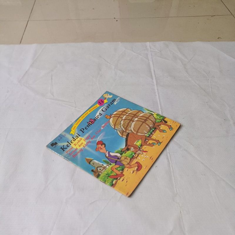 buku dongeng anak-anak bergambar KELEDAI PEMBAWA GARAM