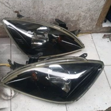 headlamp mitsubishi lancer cedia