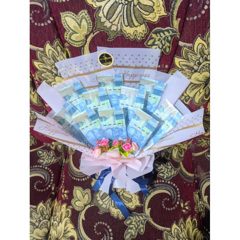 

Buket Uang Mainan