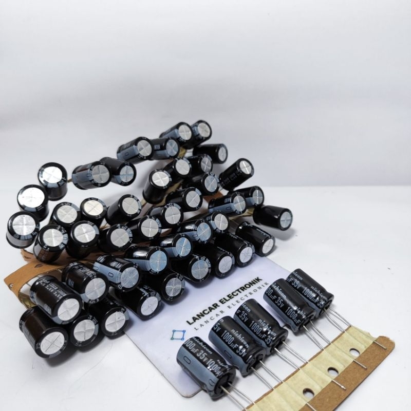 Elco 1000uf 35v / Elko 1000uf 35v  Merek Nichicon Original Hitam Roll / Renceng