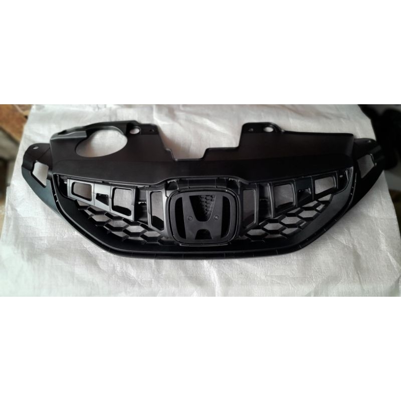 BASE GRIL DEPAN RADIATOR HONDA BRIO LAMA 2012-2015 ORINAL