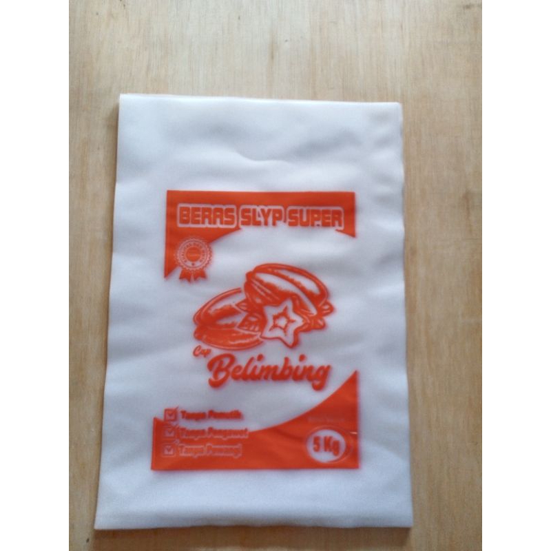 PLASTIK BERAS KEMASAN 5 KG CAP BELIMBING
