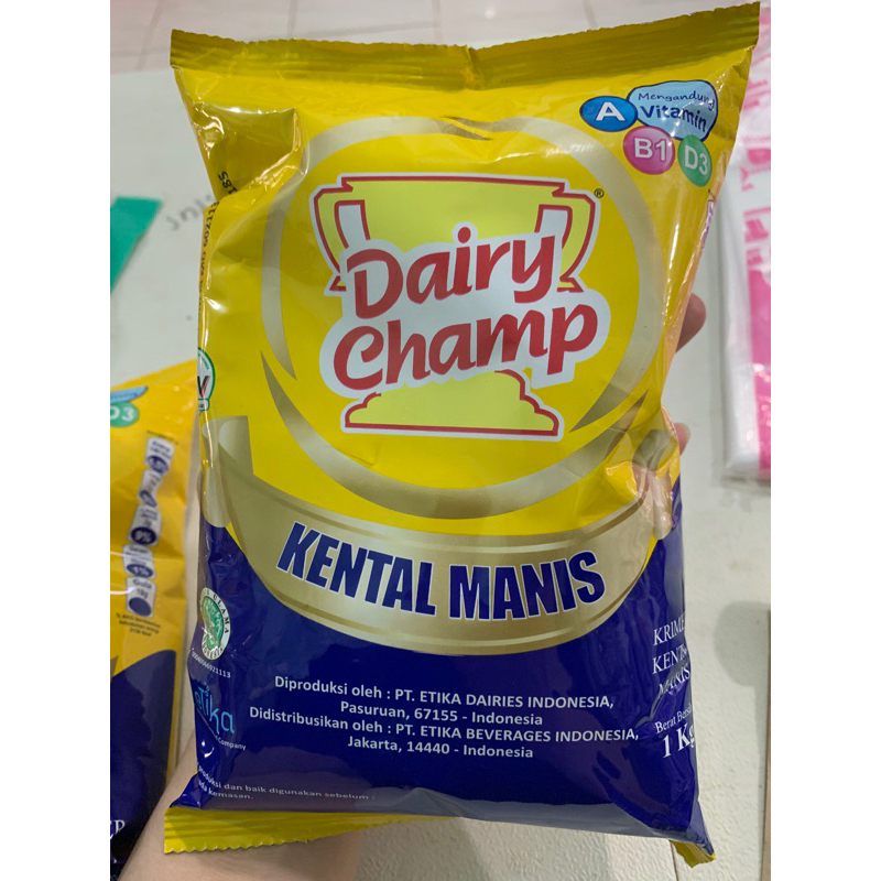 

Dairy champ 1kg susu kental manis