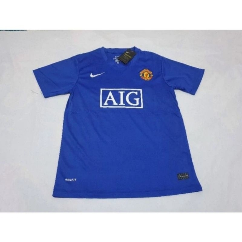 JERSEY RETRO MU AWAY 3RD 07/08 AIG BIRU