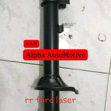 shock breaker belakang Ford fiesta laser asli