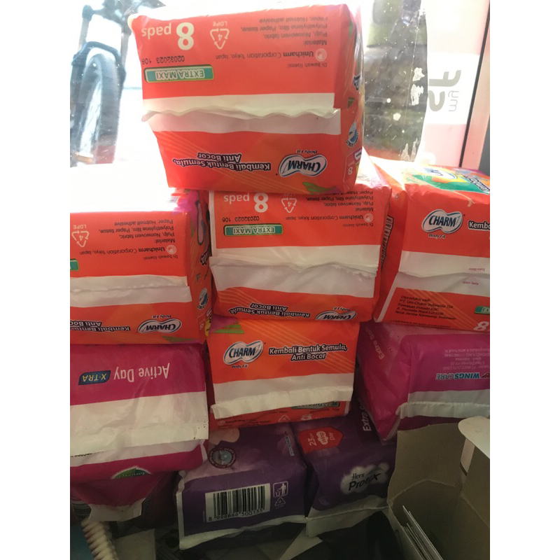 charm pembalut wanita