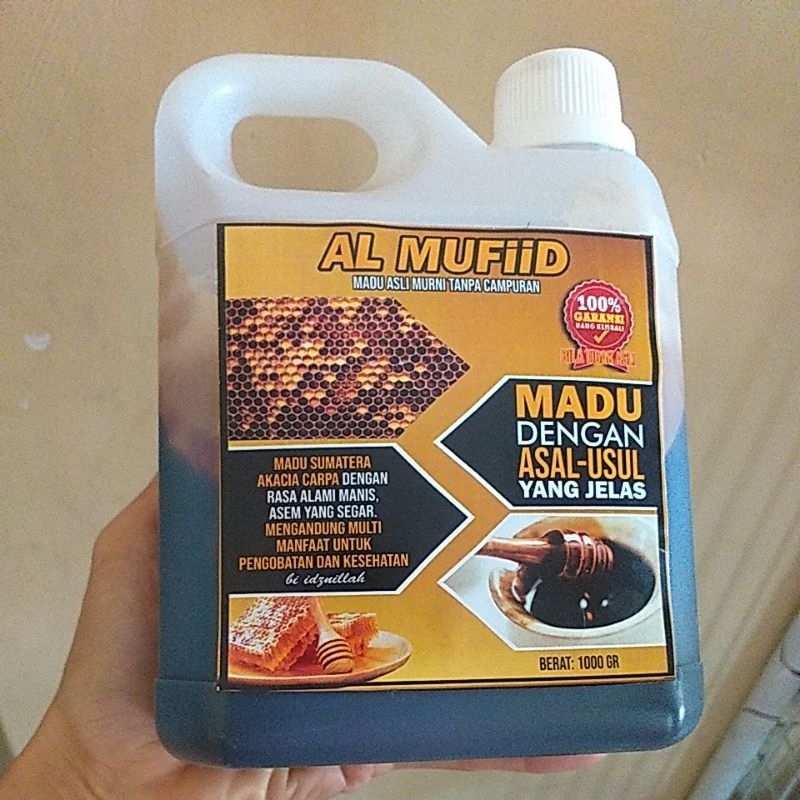 

Madu Hitam Manis 1 kg
