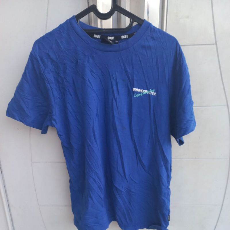 Kaos oblong cowok biru BCA brand bunker buster