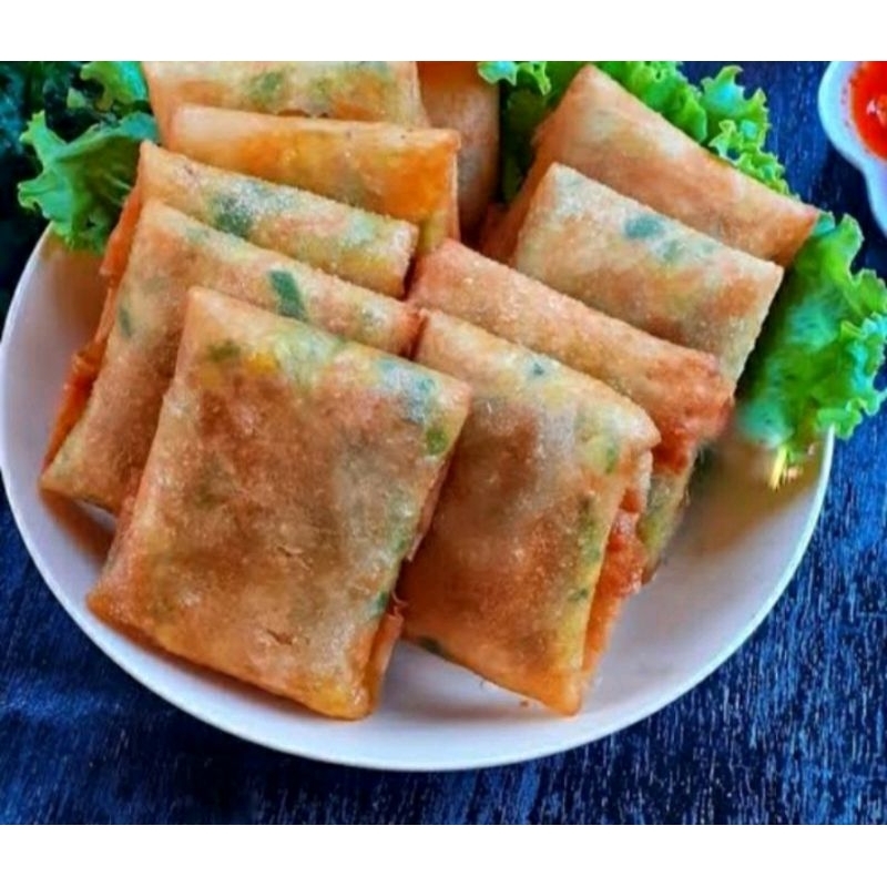 

LUMPIA AYAM MERCON 10PCS luar kota pake VAKUM FREE SAMBEL