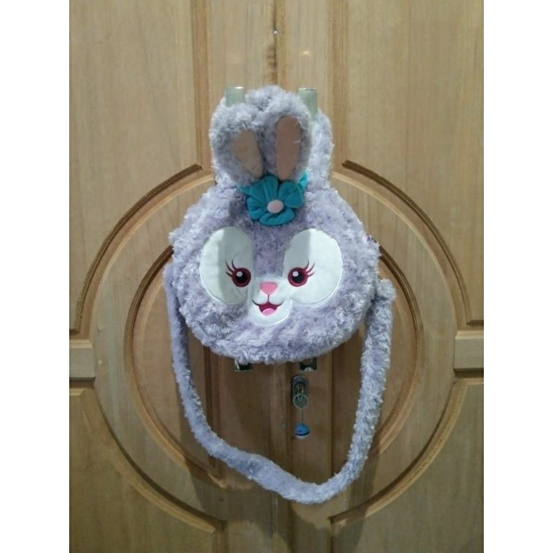 Tas boneka kepala stella lou disney