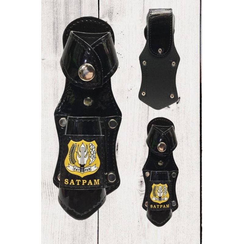 sarung tongkat satpam kilap