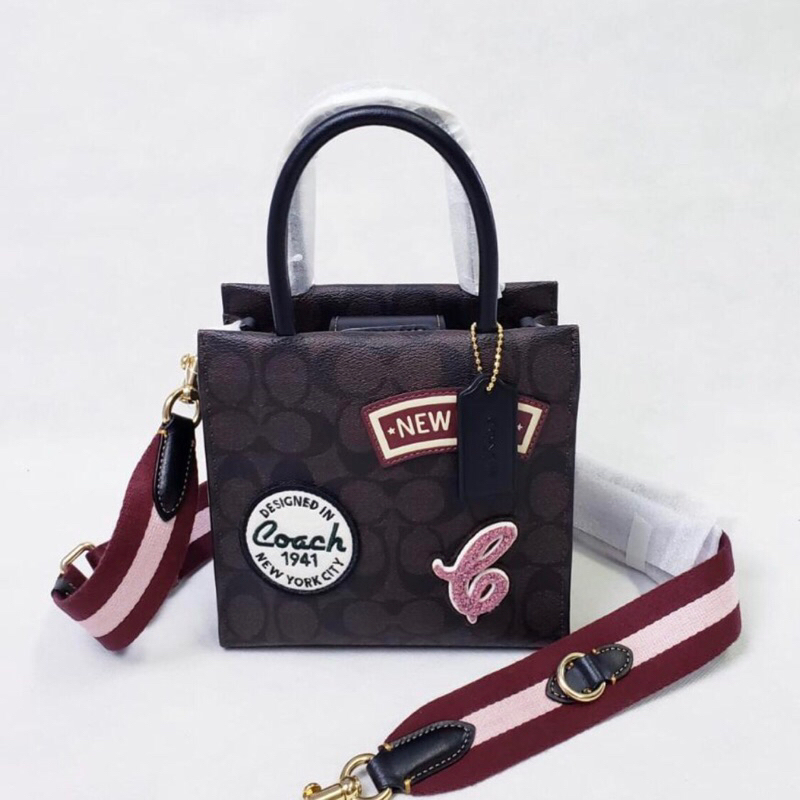 tas Coach mini cally