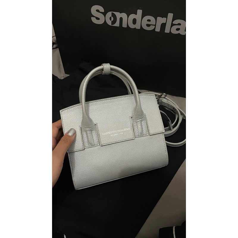 aesthetic pleasure silver bag