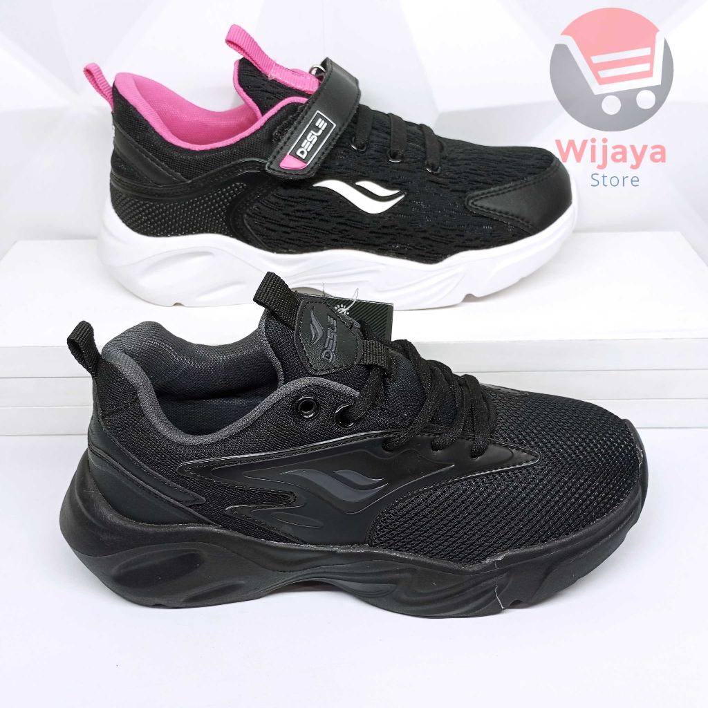 Sepatu Sekolah Desle 34-37 Model Sneaker Anak Hitam Polos Putih dengan Strap dan Tali Velcro yang Elegan dan Berkualitas Tinggi CORINA HUGHES JEREMY CORBYN ANDREA BACKER