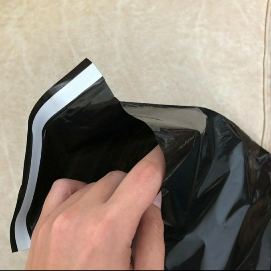 

PLASTIK POLYMAILER HITAM UK 30X40