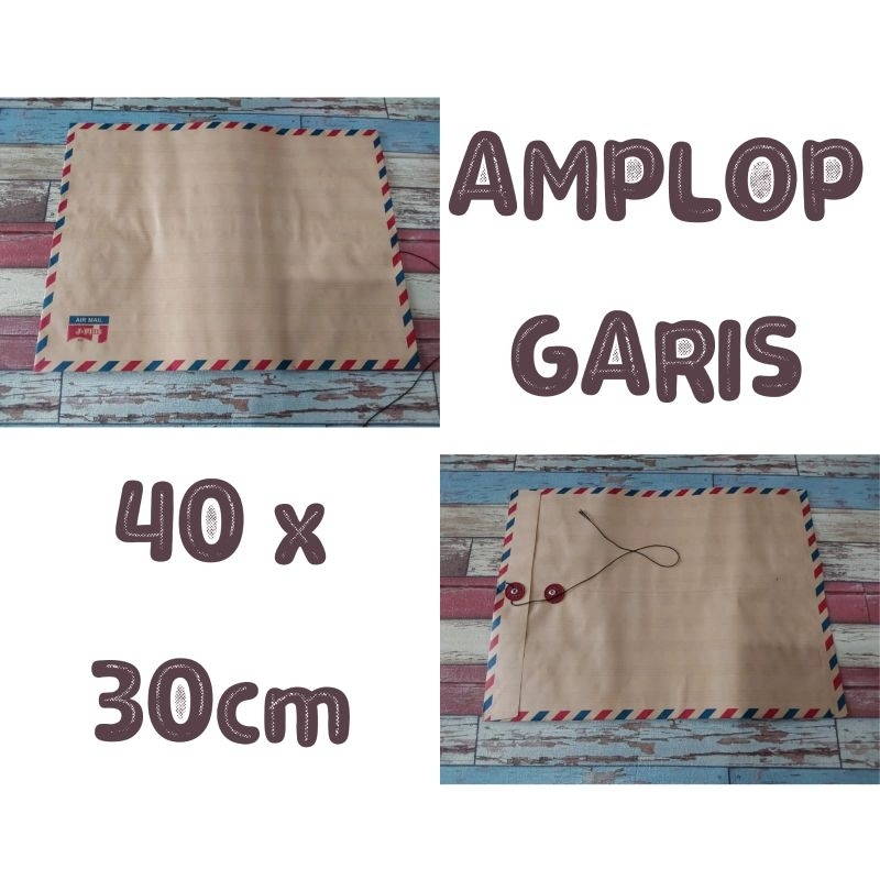 

Amplop Garis Kancing Size XL 30 x 40cm per pack isi 10