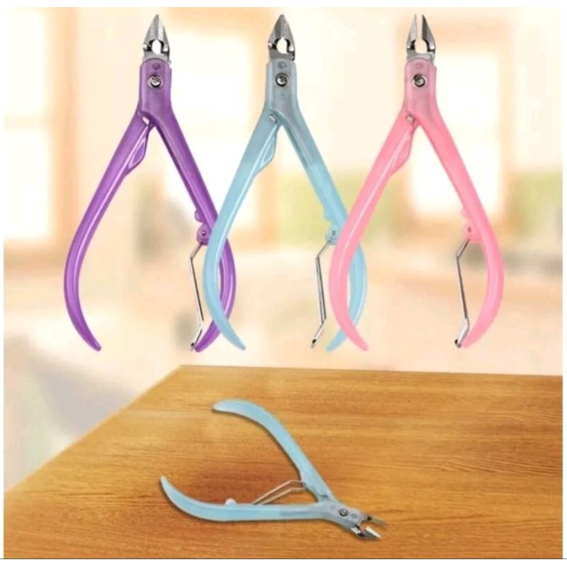 Gunting Kuku Kutikula Motif Warna