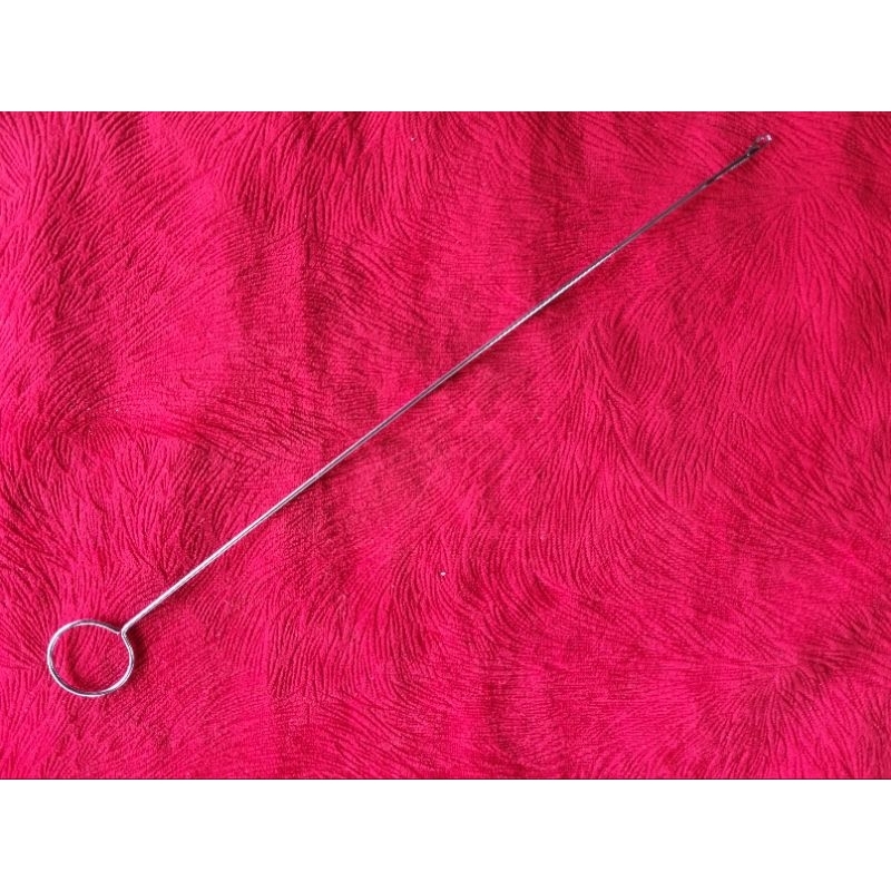 Alat pembalik jahitan