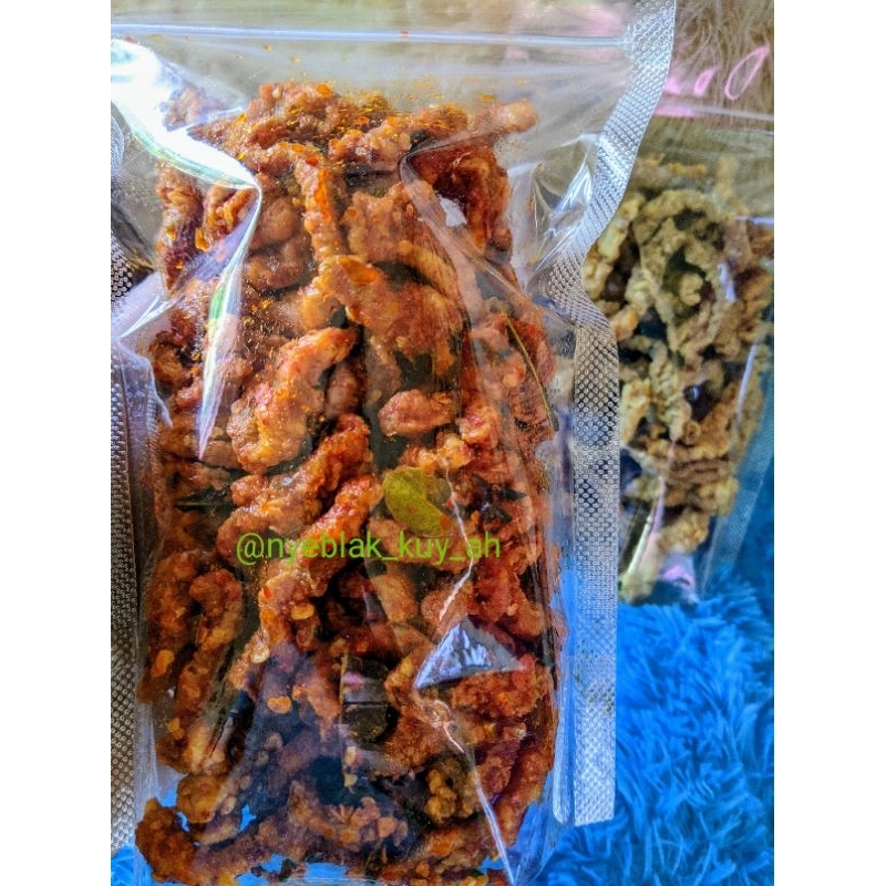 

KRIPIK USUS KRISPY PEDAS AROMA DAUN JERUK KEMASAN 100gram