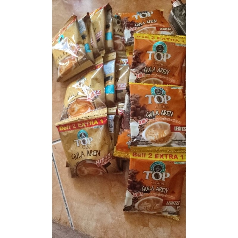 

Top Coffee Gula Aren 1 Renteng = 15 Sachet