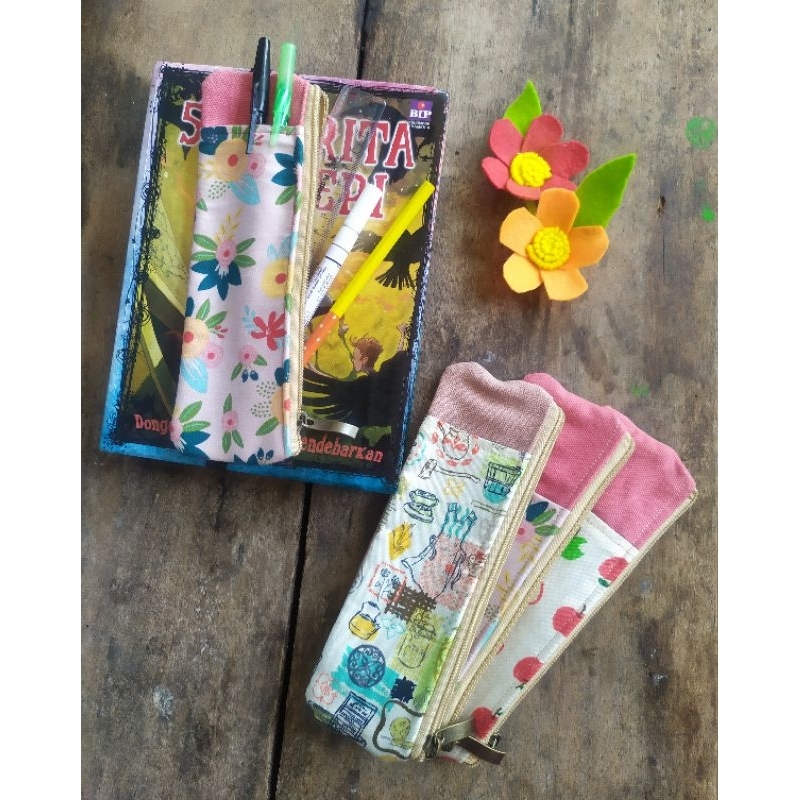 

Tempat Pensil Pembatas Buku