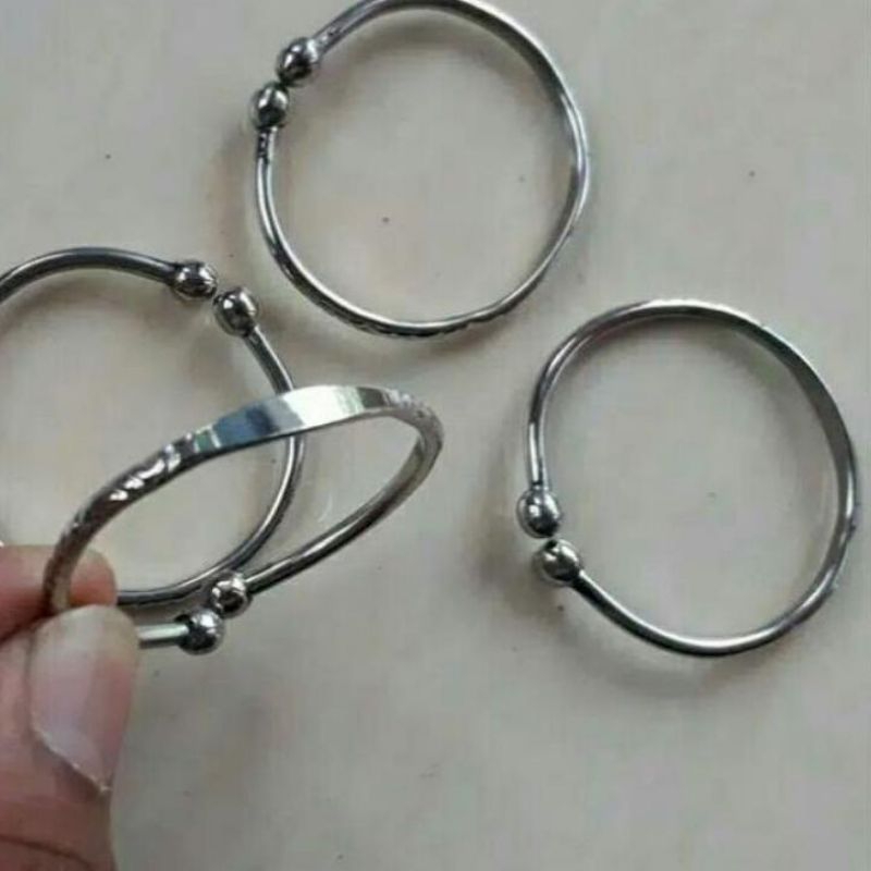 Gelang bayi tribusono ukir tanpa nama baja putih original