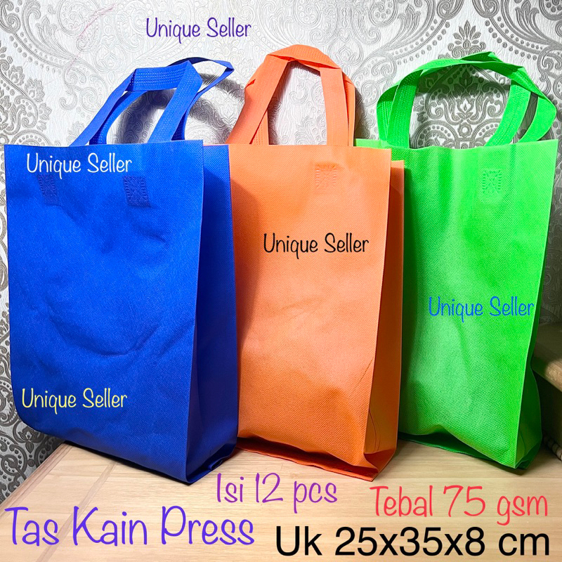 [Isi 12] Tas Kain Spunbound 25x35 cm 75 Gsm / Tas Kain Tali 25x35x8 cm / Tas Kain Spunbound Press 25x35cm / Tas Kain Press Tali 25x35x8cm