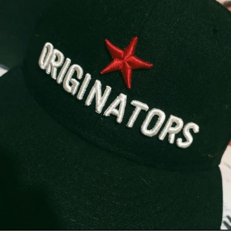 topi Vtg keren