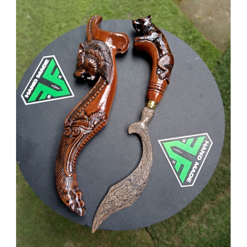 kujang pamor besar ukiran singa