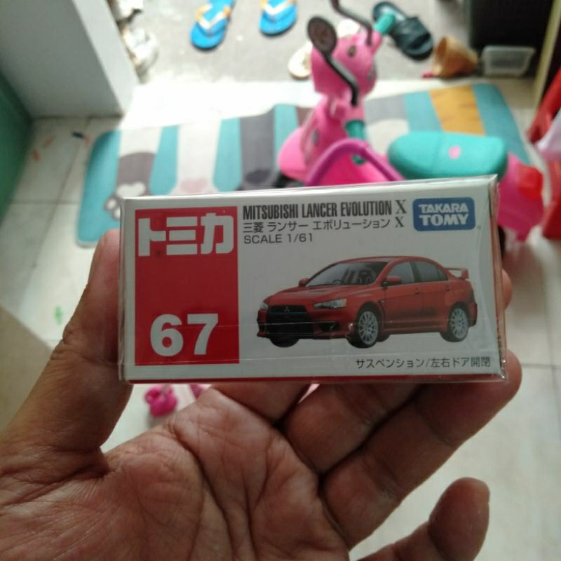 Tomica mitsubishi Lancer evo X merah