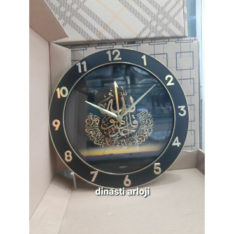 jam dinding kaligrafi / pioneer