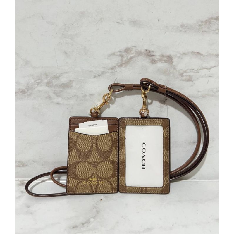 

Coach 63274 Lanyard Id Tag Signature Khaki / Saddle