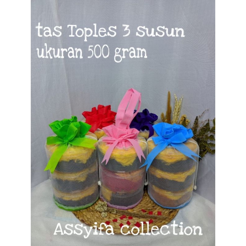 

Tas Toples Kue Kering Lebaran Bahan Kombinasi Tile Dan Spund Bond Ukuran 500 Gram