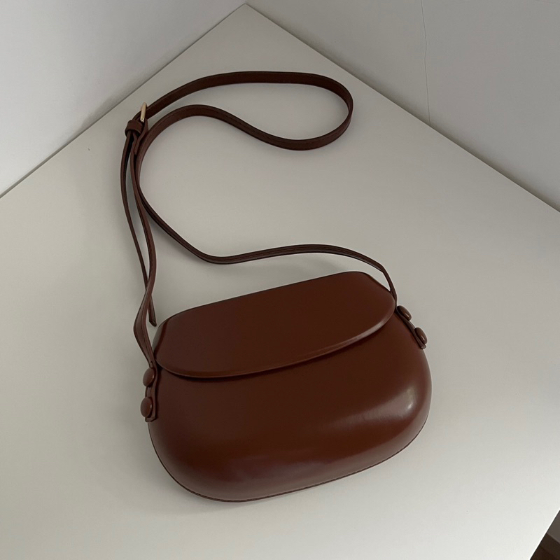 CLOTHIER | Mary Slingbag