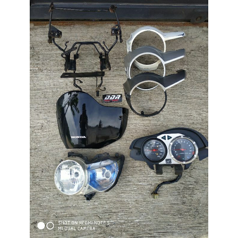 reflektor lampu pece cover atas bawah breket spedometer tiger revo pece ori copotan