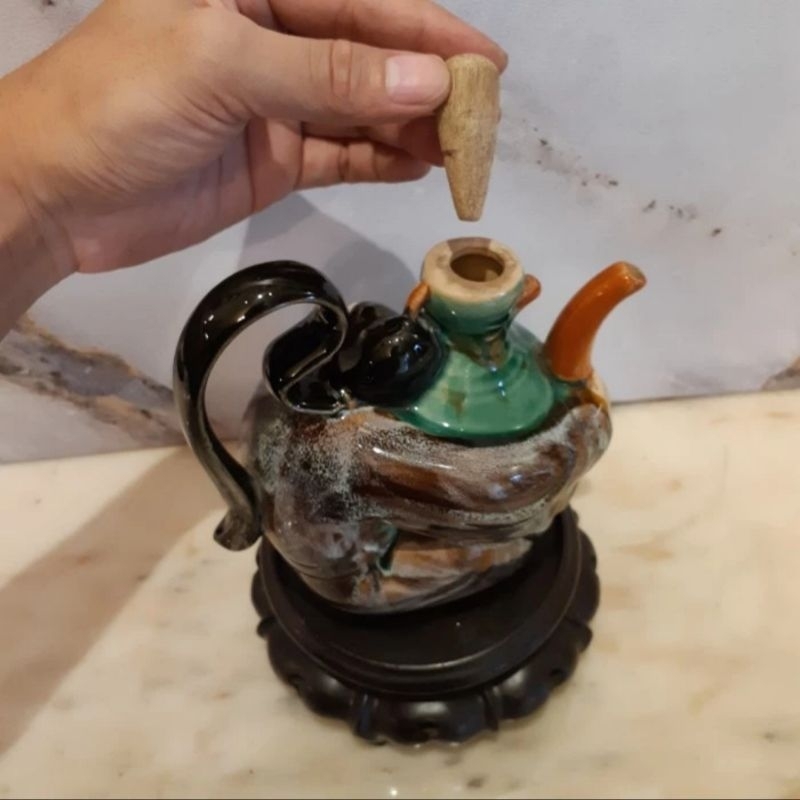 Teko Keramik Motif Dewa Mabuk
