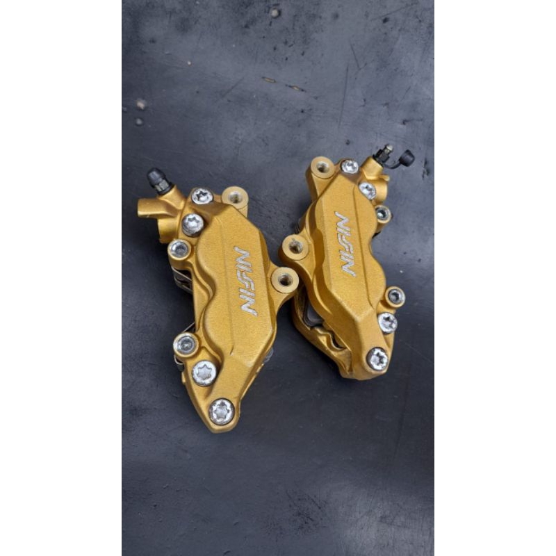 kaliper nissin 4piston lepasan motor