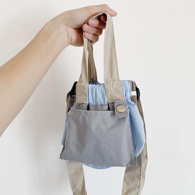 [PRELOVED] NORU LABEL – Tiny Fuku Dumpling Bag Nude-Baby Blue-Grey