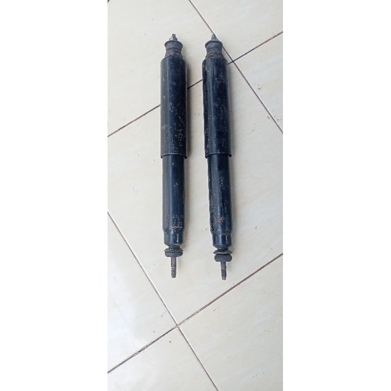 shock belakang mazda vantrend